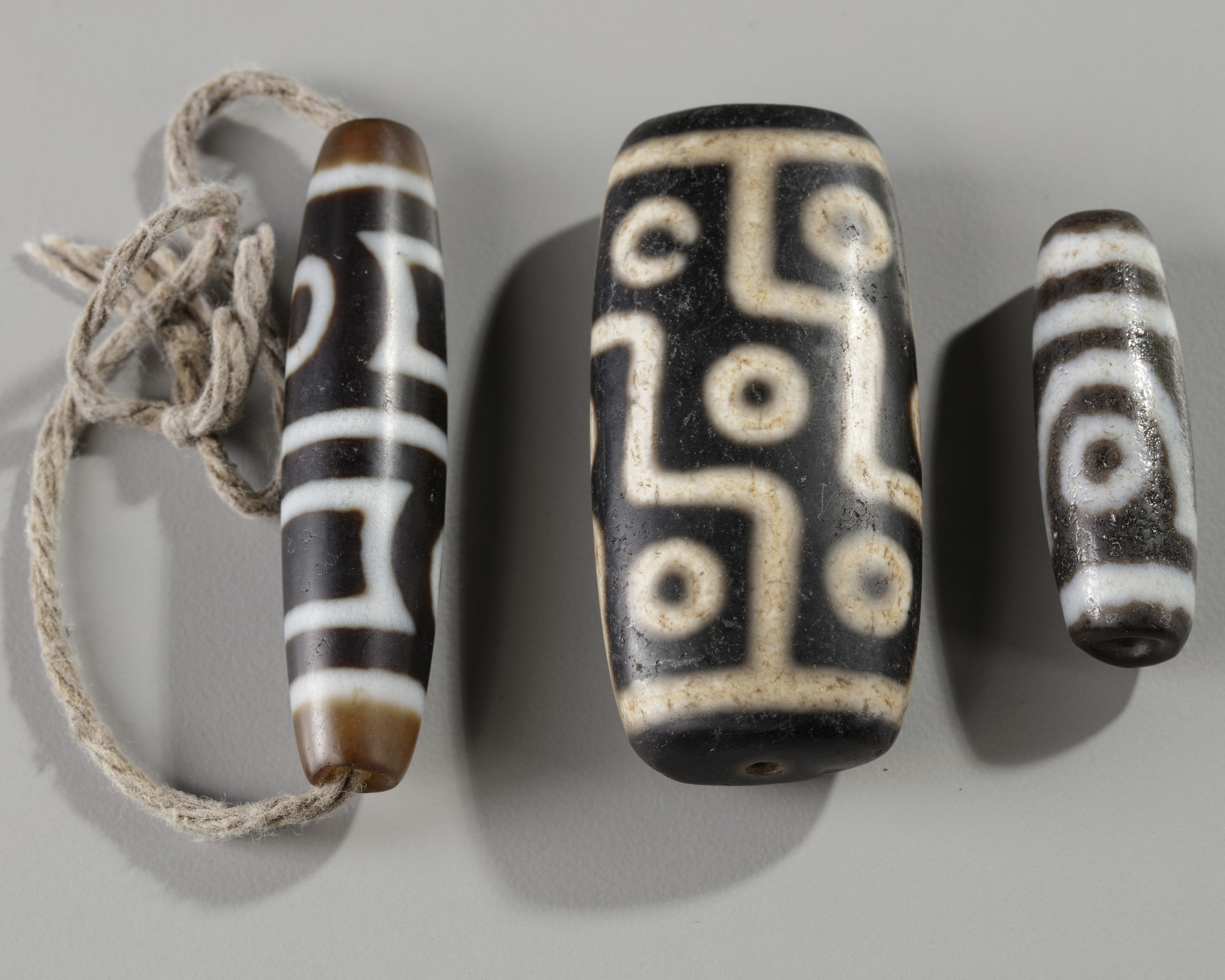Three Tibetan Dzi beads OAA