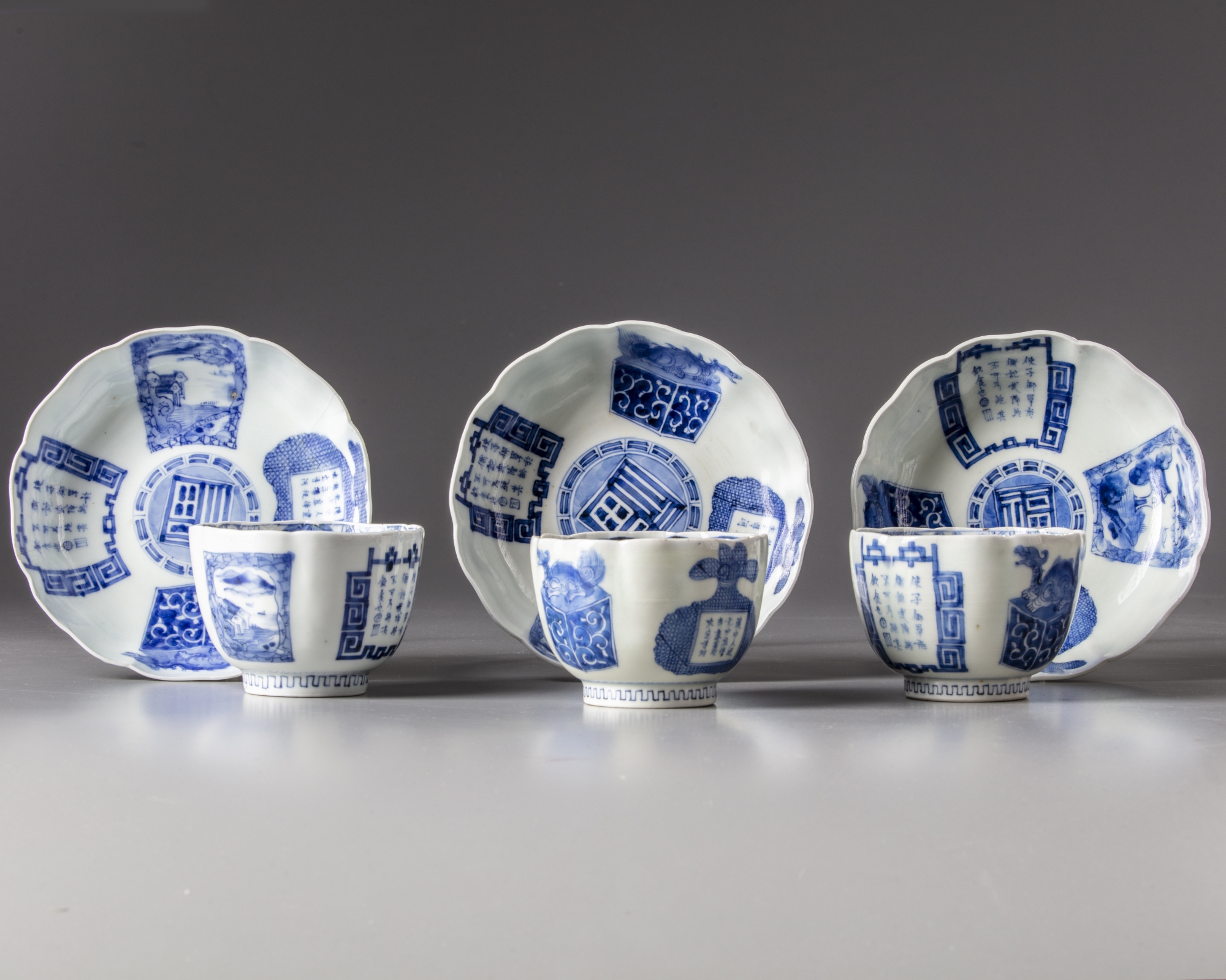 Three large Japanese cups with saucers OAA