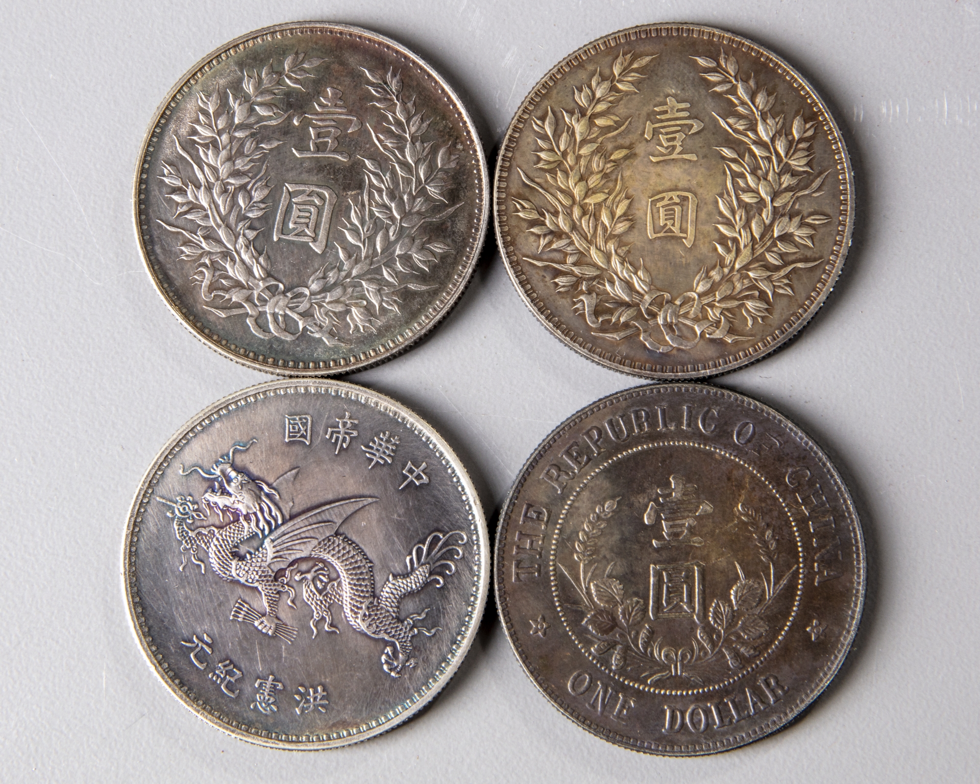 Four Chinese silver coins OAA