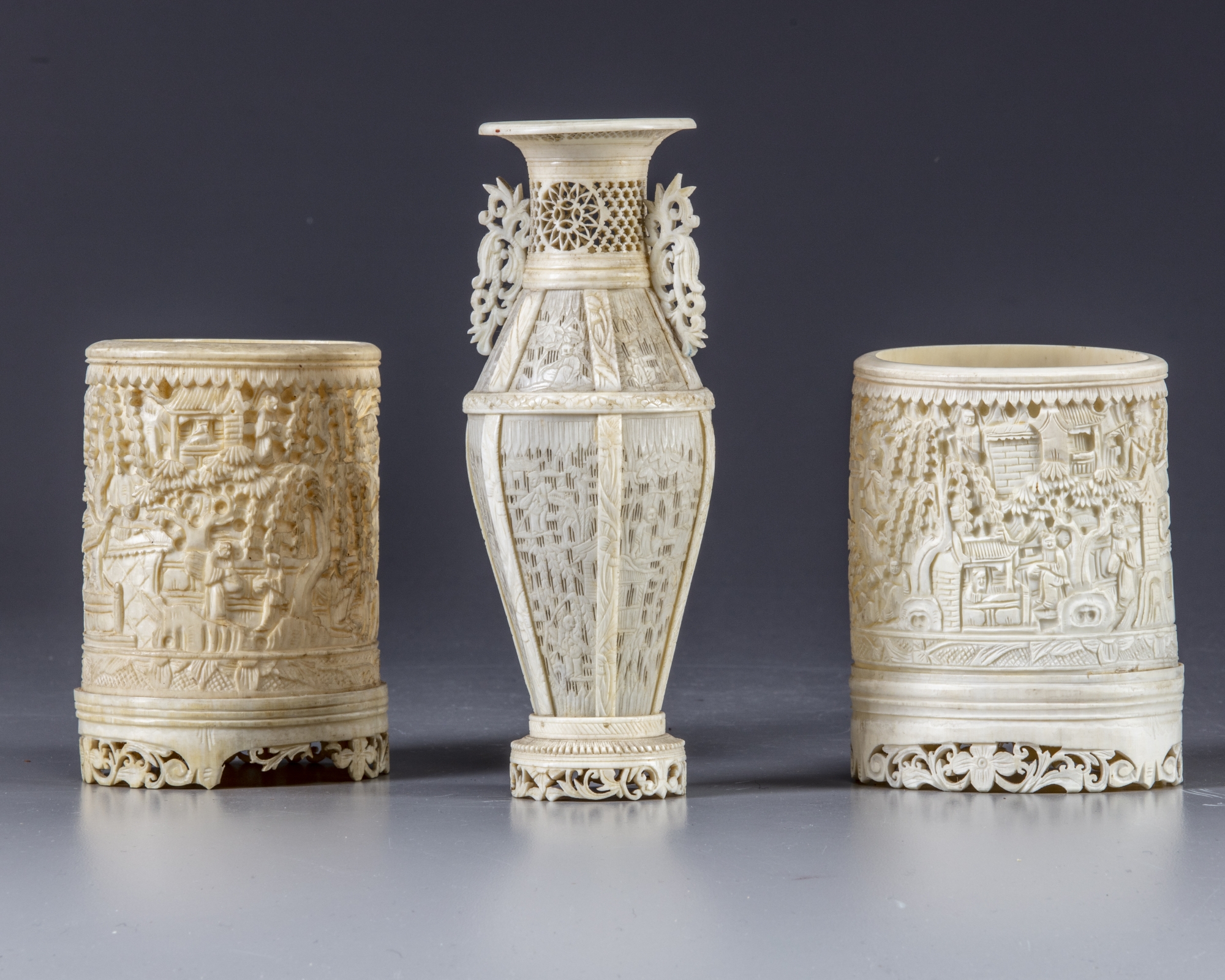 A group of three ivory carvings OAA