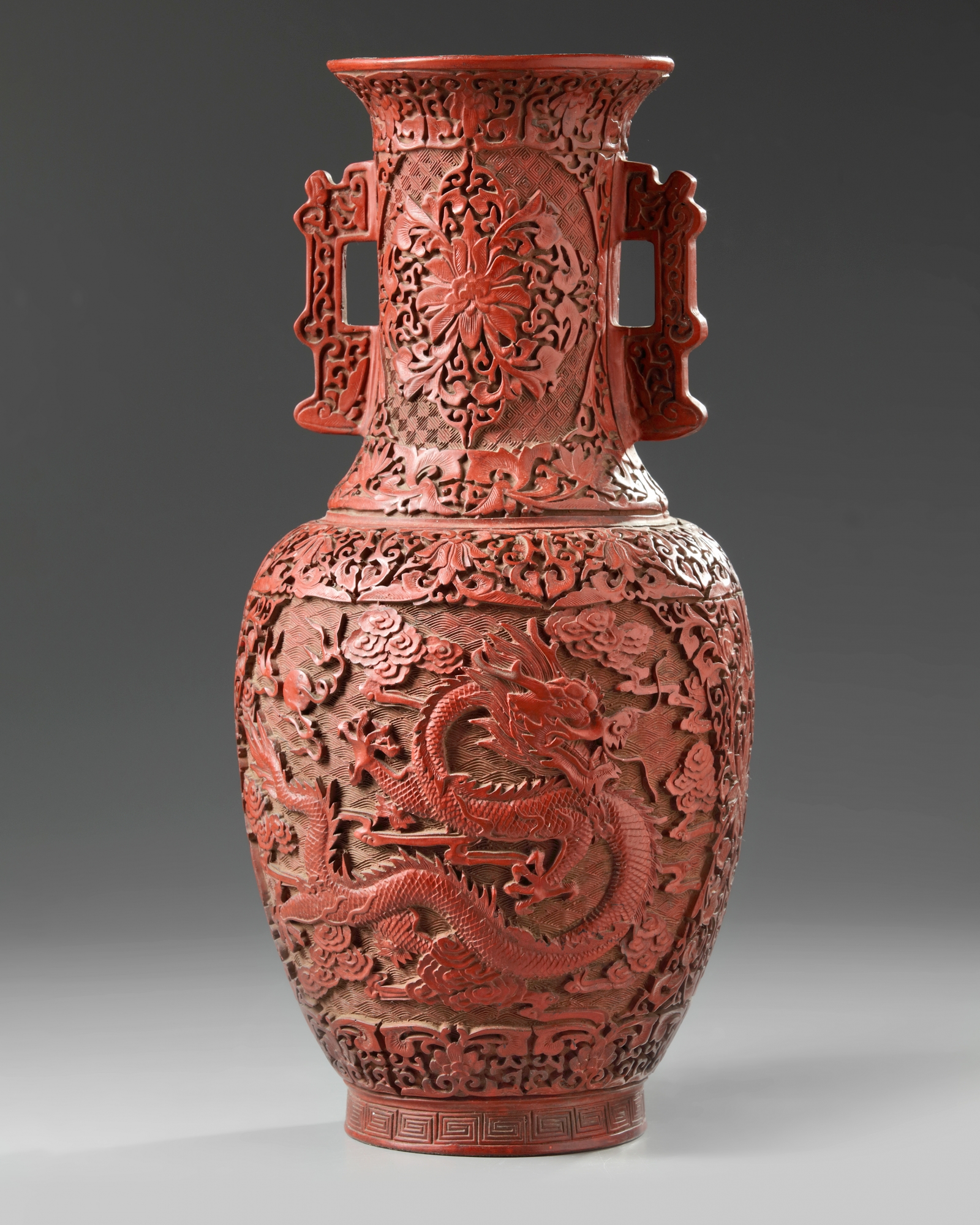 A Chinese carved cinnabar lacquer vase OAA