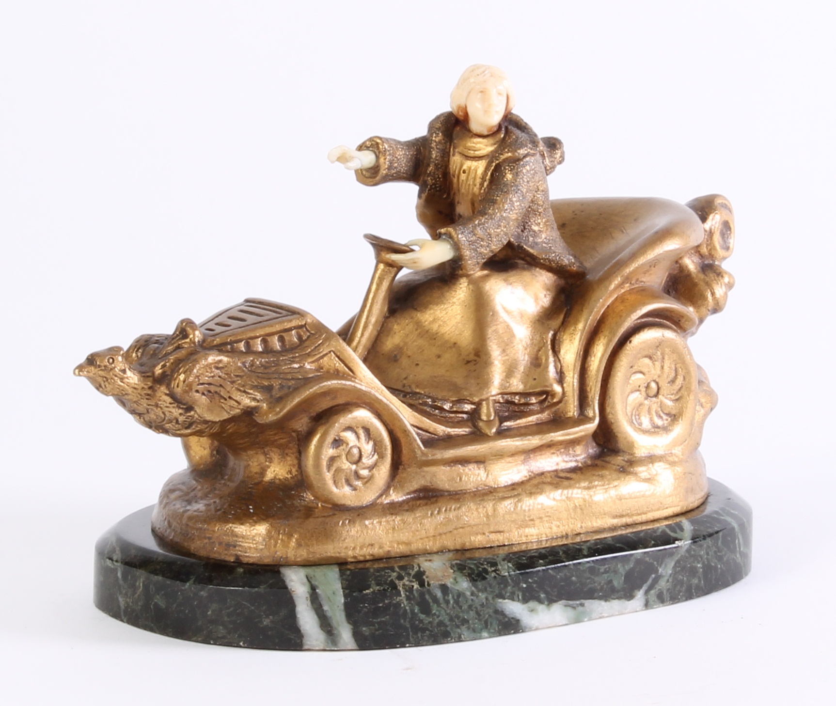 winnaar Verslagen Dood in de wereld Een Art Deco brons marmer en ivoor beeldje van een auto, circa 1920. |  ArtListings