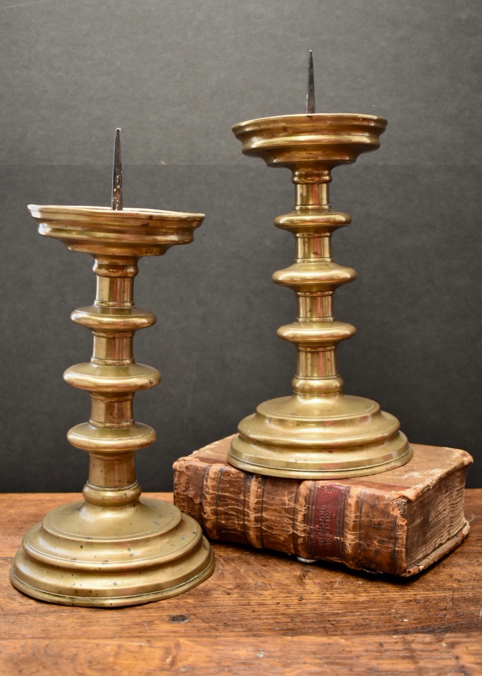 Pair of Gothic brass candlesticks