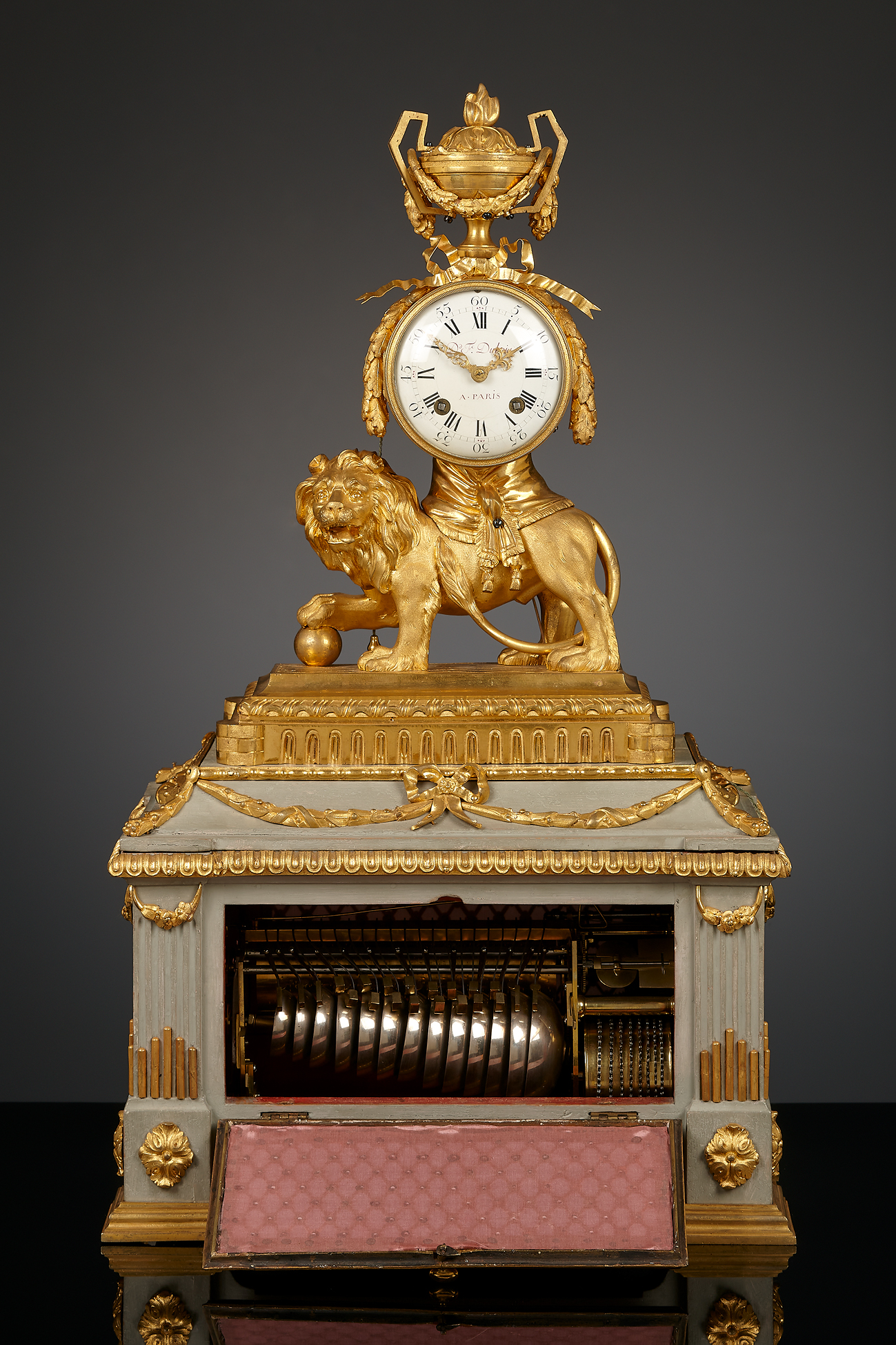 French Louis XVI lion mantel clock with musical box | ArtListings