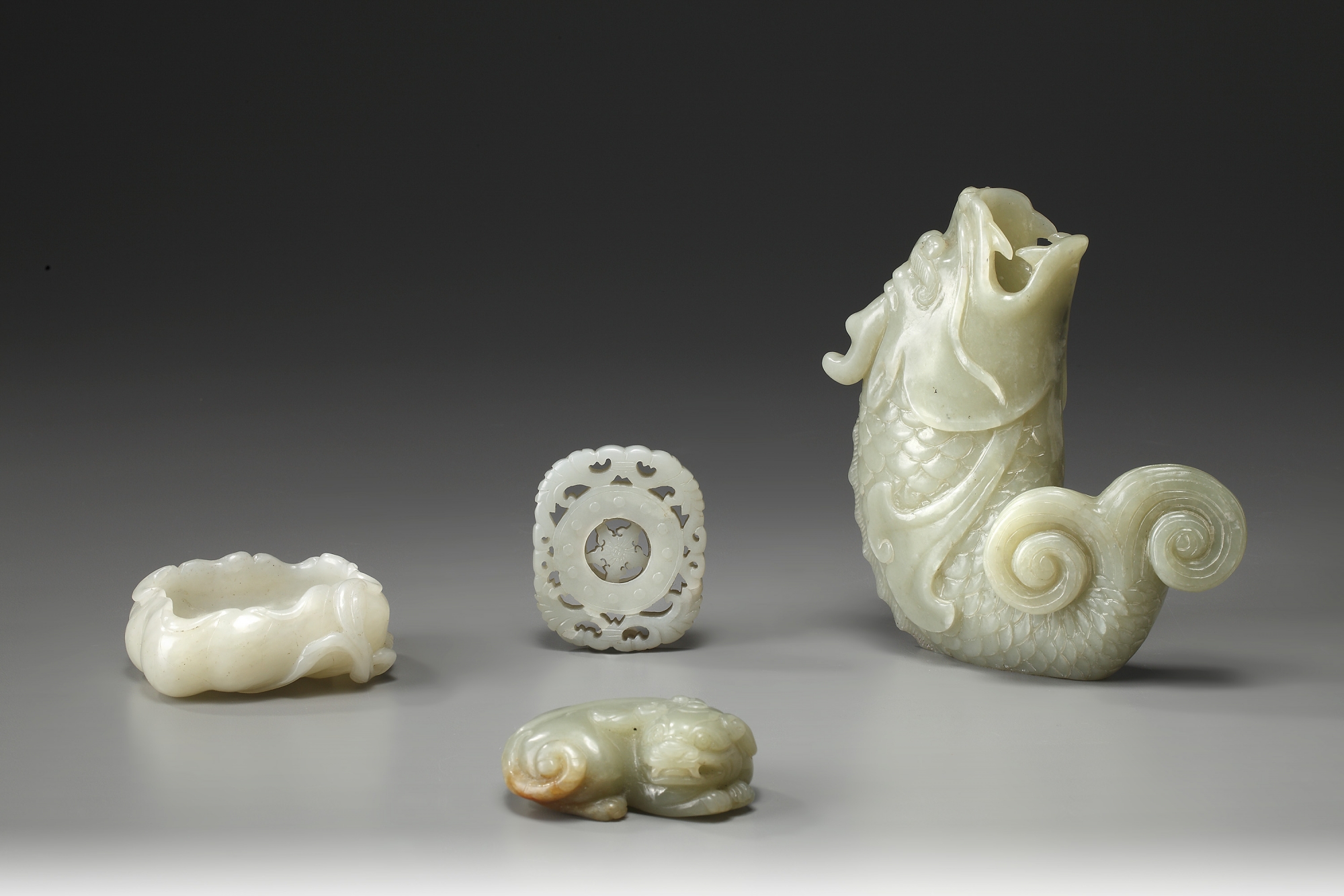 A Collection of Four Carved Jade ArtIfacts OAA
