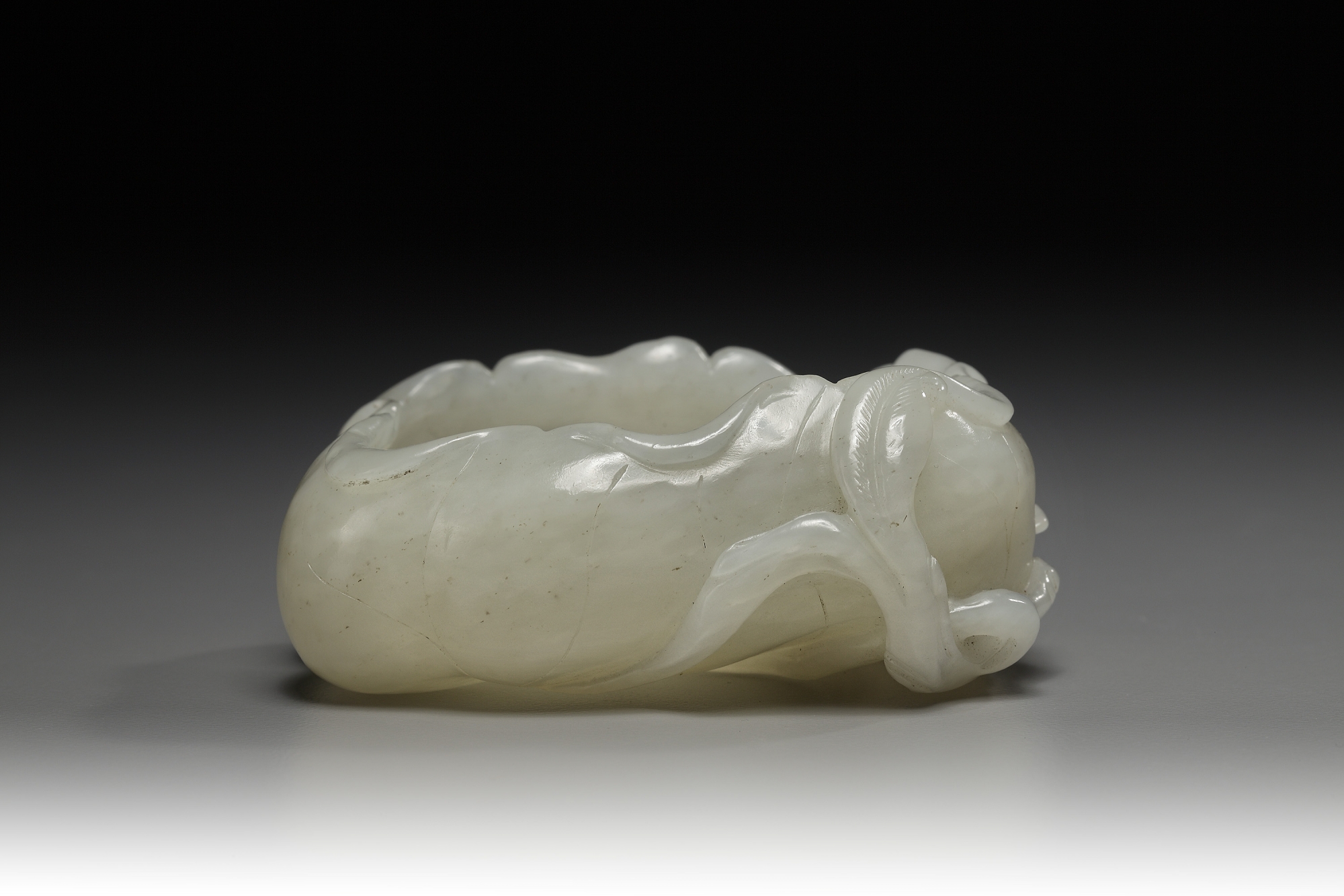 A Collection of Four Carved Jade ArtIfacts OAA