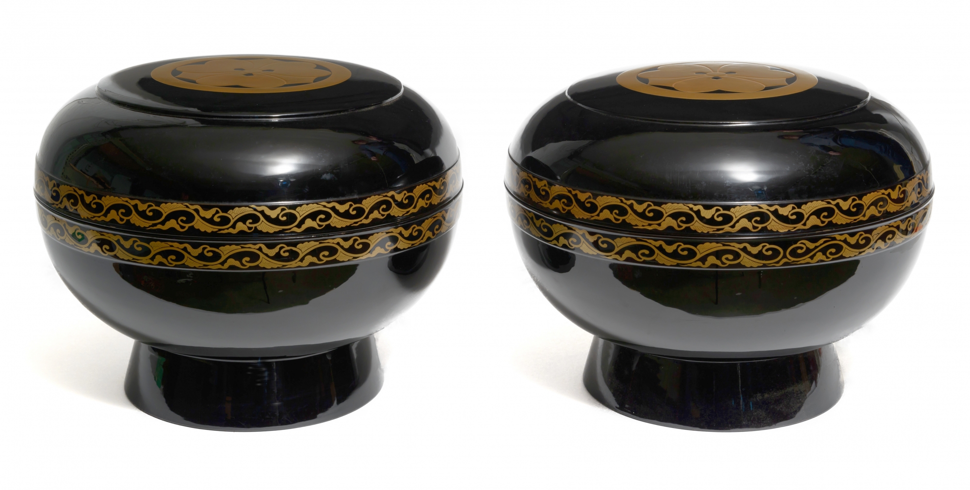 A set of two large black lacquered food-containers | OAA