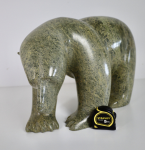 Ashevak Adla (1977 Cape Dorset, Canada), a large serpentine stone sculpture of a Polar bear, titled 'Moving Mountains'.. - Ashevak Adla