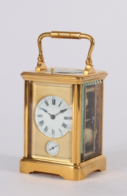 A French gilt brass quarter repeating alarm carriage timepiece circa 1880