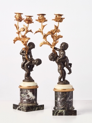 A Pair of French 'Louis XVI' figurative candelabras with putti, circa 1780