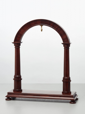 An elegant walnut contemporary custom made stand for displaying a watch