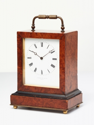 An elegant French burr-walnut ‘time-piece’ travelling clock, circa 1840