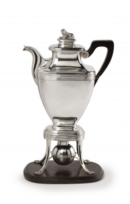 Silver coffee pot on chafing dish