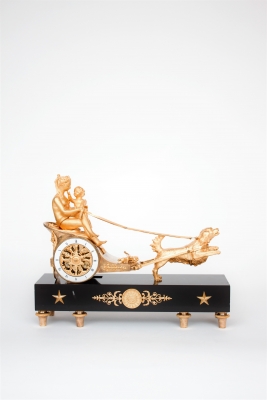 A French empire ormolu and marble chariot mantel clock, circa 1800