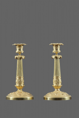 A pair of French late Empire candlesticks, around 1810
