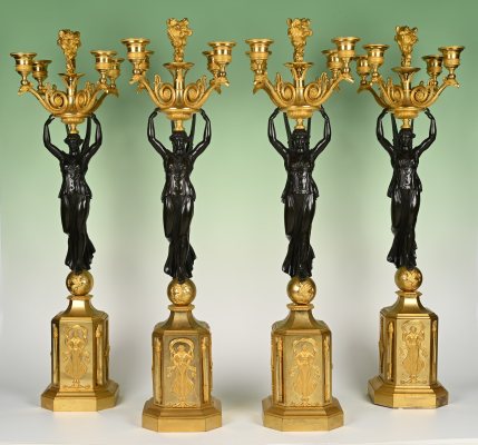 A set of four large Empire candelabra