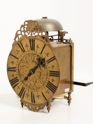 A well engraved French brass alarm lantern timepiece, circa 1740