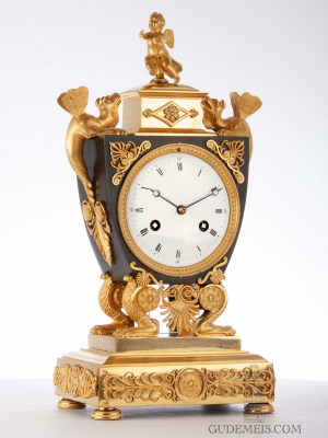 A good French Empire gilt and bronze urn mantel clock, circa 1800
