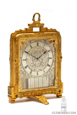 An English engraved gilt brass strut clock, pre numbered, Cole, circa 1845.