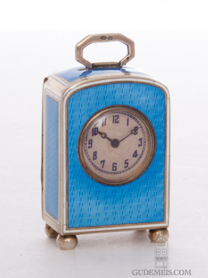 A sub miniature Swiss Art Deco guilloche enamel travel clock, circa 1920