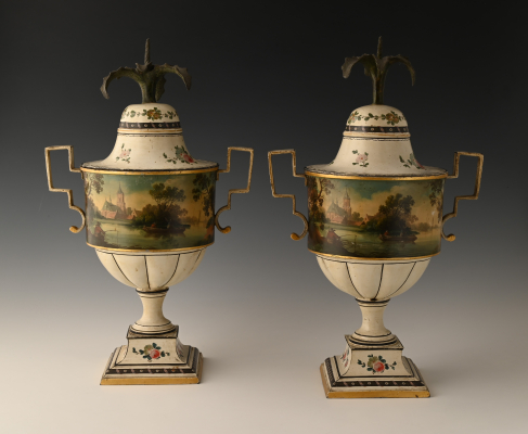 A pair of rare pewter chestnut vases