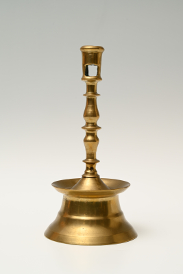 A Dutch bronze candlestick