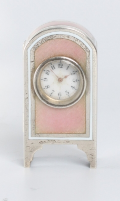 A miniature Swiss silver pink translucent guilloche enamel timepiece, circa 1900.