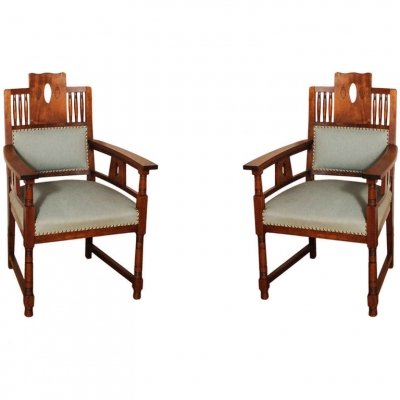 A Dutch Art Deco mahogany dining room set of a table and four chairs, circa 1920