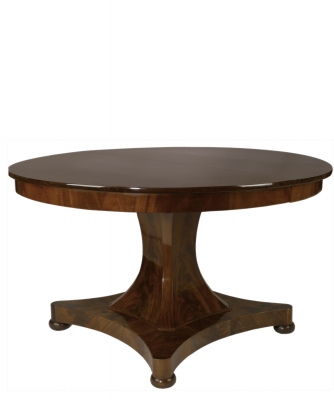 An Empire Mahogany Round and Extendable Table