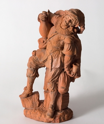 A Terracotta Sculpture of a Drinking Peasant