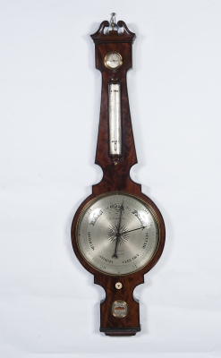 An imposing king size wheel barometer by 