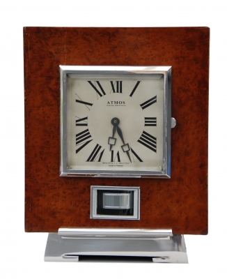 M149 Atmos clock, Amboina wood, J.L. Reutter, France circa 1930.