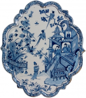 An Oval Chinoiserie Plaque in Blue and White Dutch Delftware