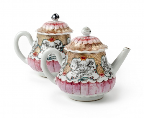 A pair of Chinese famille rose lotus-shaped teapots and covers