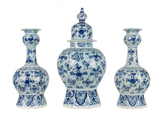 A Blue and White Three - Piece Octogonal Dutch Delft Garniture