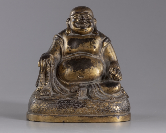 A gilt bronze figure of budai | OAA