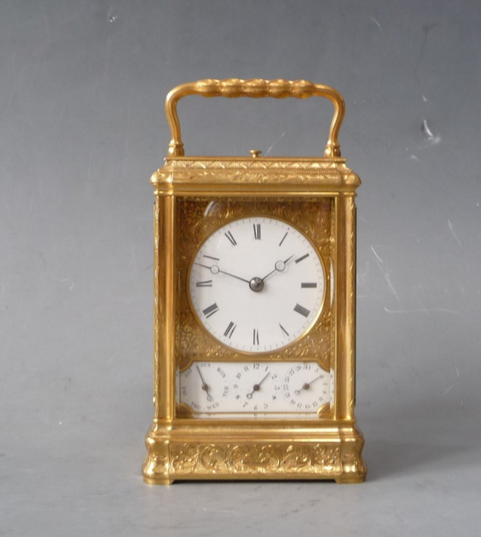 A fine gorge case carriage clock signed Drocourt eight day calendar
